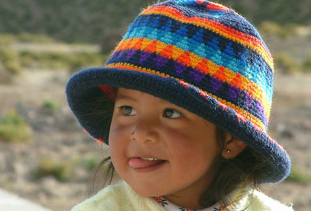 Cute young face from the Andes - Bolivian girl.
