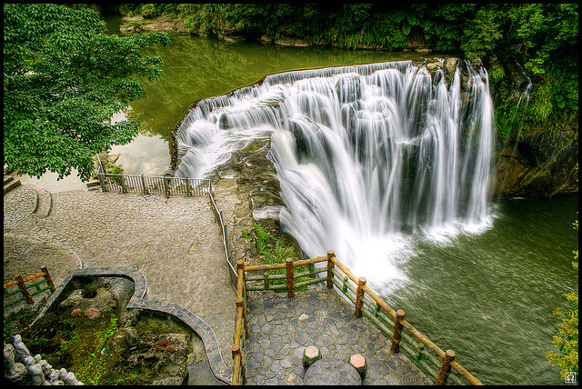 Shifen waterfall is a scenic waterfall located in Pingxi District, Taiwan, on the upper reaches of the Keelung River.