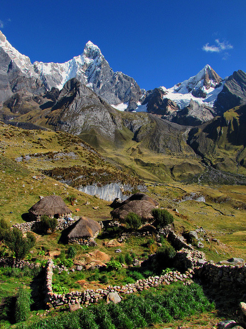 by mikemellinger on Flickr.Traditional houses at the footsteps of Cordillera Huayhuash in Peru.