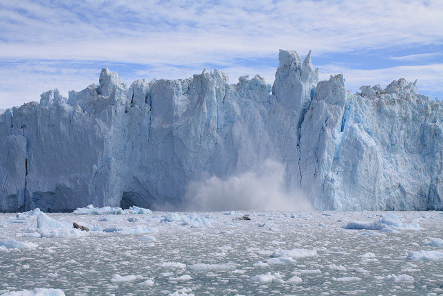 by ClaramedC on Flickr.Massive blocks of ice falling from Eqip Sermia Glacier in Western Greenland.