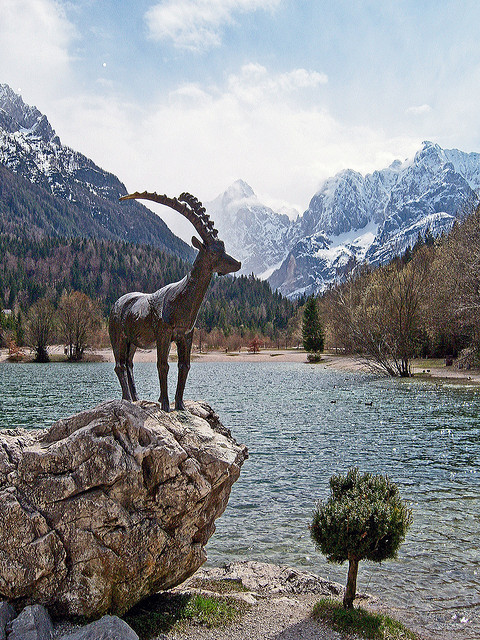 The bronze ibex at Jasna Lake, Dinaric Alps, Slovenia
